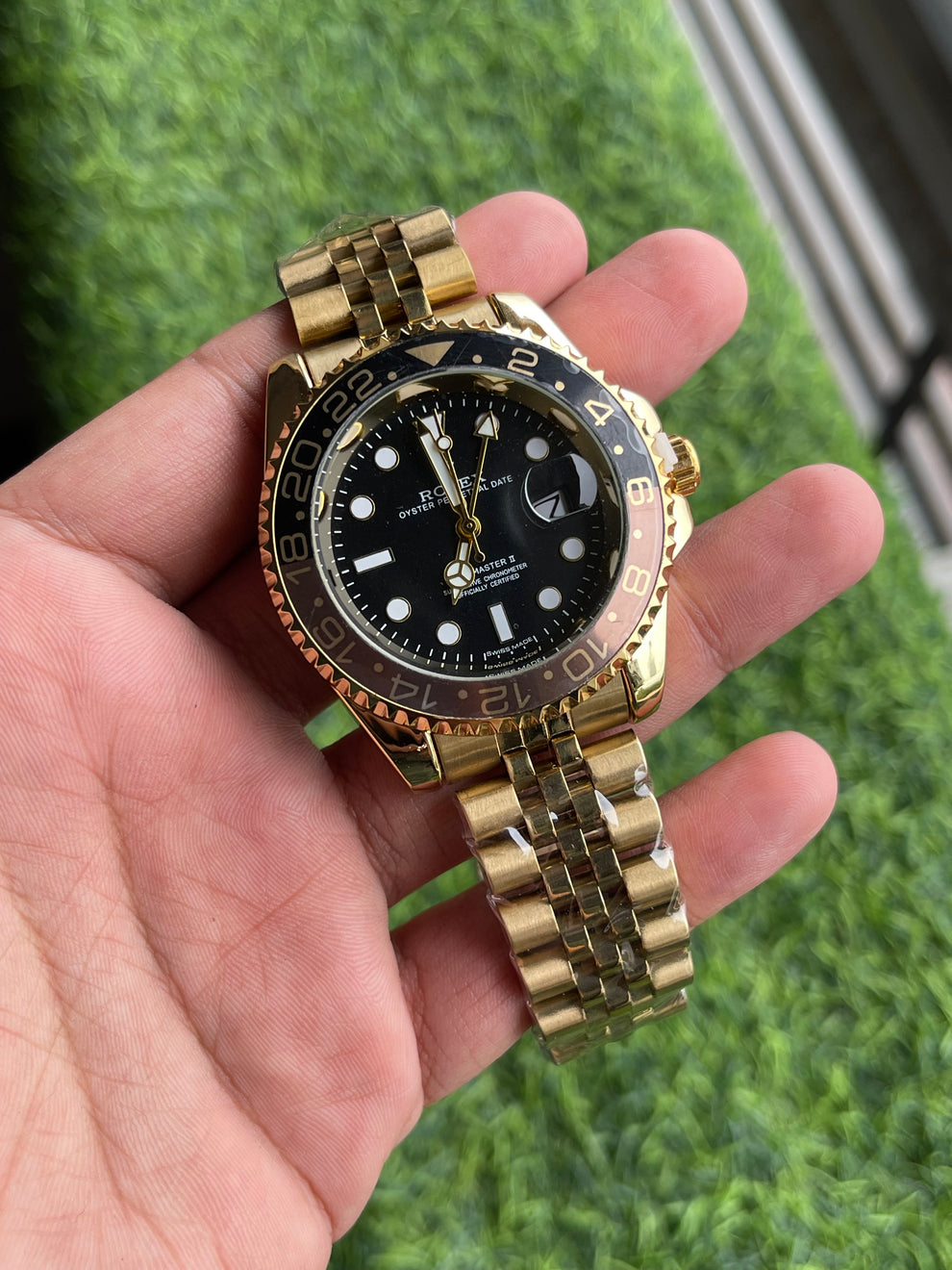 Rolex GMT Master Gold Black Quartz